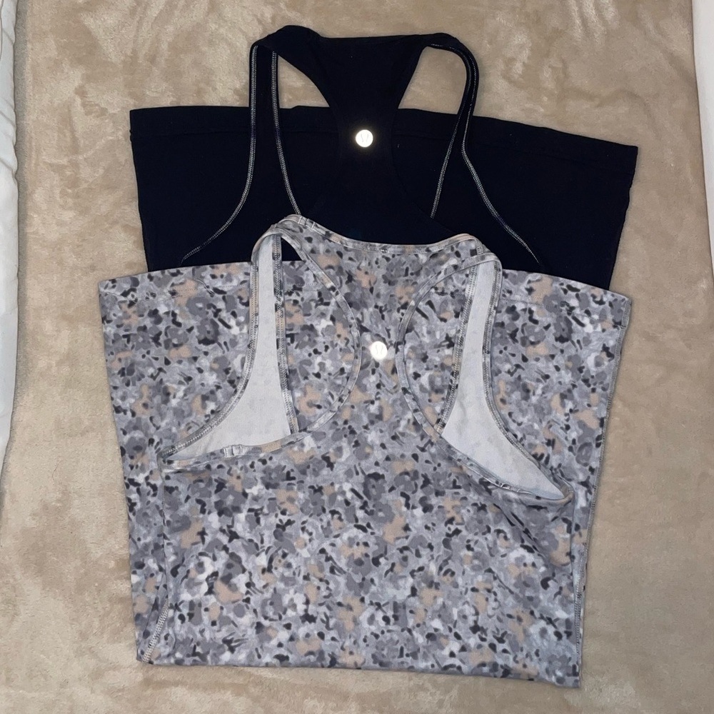 Pair of Lululemon size 6 workout tanks - black and grey speckled